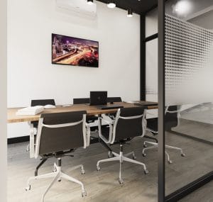 Modern Office meeting room with ergonomic chairs, glass walls, and gradient privacy graphics.